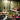 peaceful morning scene showing yoga, oil massage, and natural routine activities