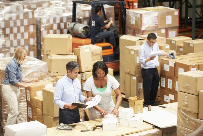 Warehouse employees packing D2C e-commerce orders for Indian brand