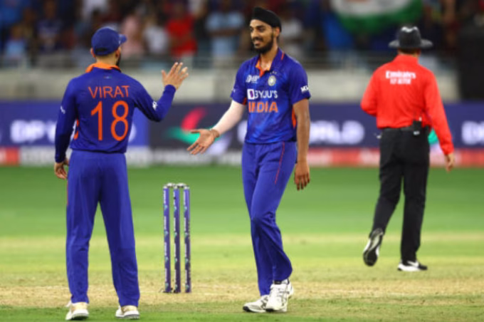Arshdeep Singh and Virat Kohli