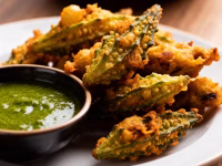 Golden crispy karela pakodas