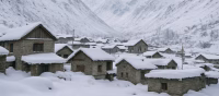 Snow covered houses and mountains in Drass village