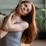 Woman doing neck stretch