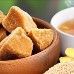 bowl of golden-brown jaggery pieces