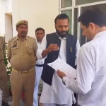 Memorandum submitted to the District Magistrate regarding the dilapidated road.