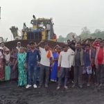 Threat to Livelihood: Unorganized workers at Muraidih Colliery vent their anger; halt operations by blocking traffic.