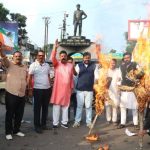 Youth Congress stages massive protest in Dhanbad; effigies of PM Modi and Education Minister Dharmendra Pradhan burnt.