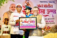 governor-santosh-gangwar-honors-khortha-lyricist-vinay-tiwari